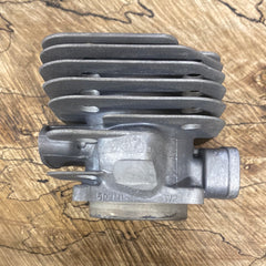 Jonsered 670 chainsaw cylinder (with boot type intake) new Mahle (upstairs)