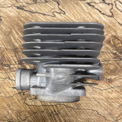 Jonsered 670 chainsaw cylinder (with boot type intake) new Mahle (upstairs)