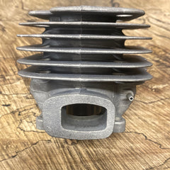 Jonsered 670 chainsaw cylinder (with boot type intake) new Mahle (upstairs)