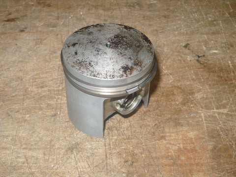 dolmar 123 chainsaw and 309 saw piston and rings used  pn 122 132 100 (includes pin and clips)