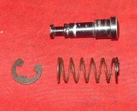 remington built john deere 8 chainsaw throttle lock button and spring (rem. sl bin)