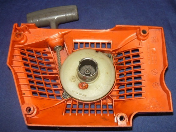 husqvarna 357xpg chainsaw starter recoil cover and pulley assembly