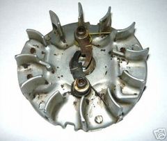McCulloch SP-60 SP60 Chainsaw Flywheel w/ Starter Pawls