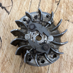 Husqvarna 242 Special Chainsaw flywheel and starter pawls assembly