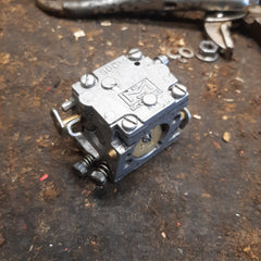 off a running mcculloch mac 10-10 chainsaw sdc carburetor type 2 (short jet)